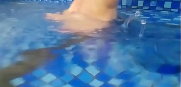  Foot fetish in pool. Mature plays with her legs in the water and teases you with wet feet.